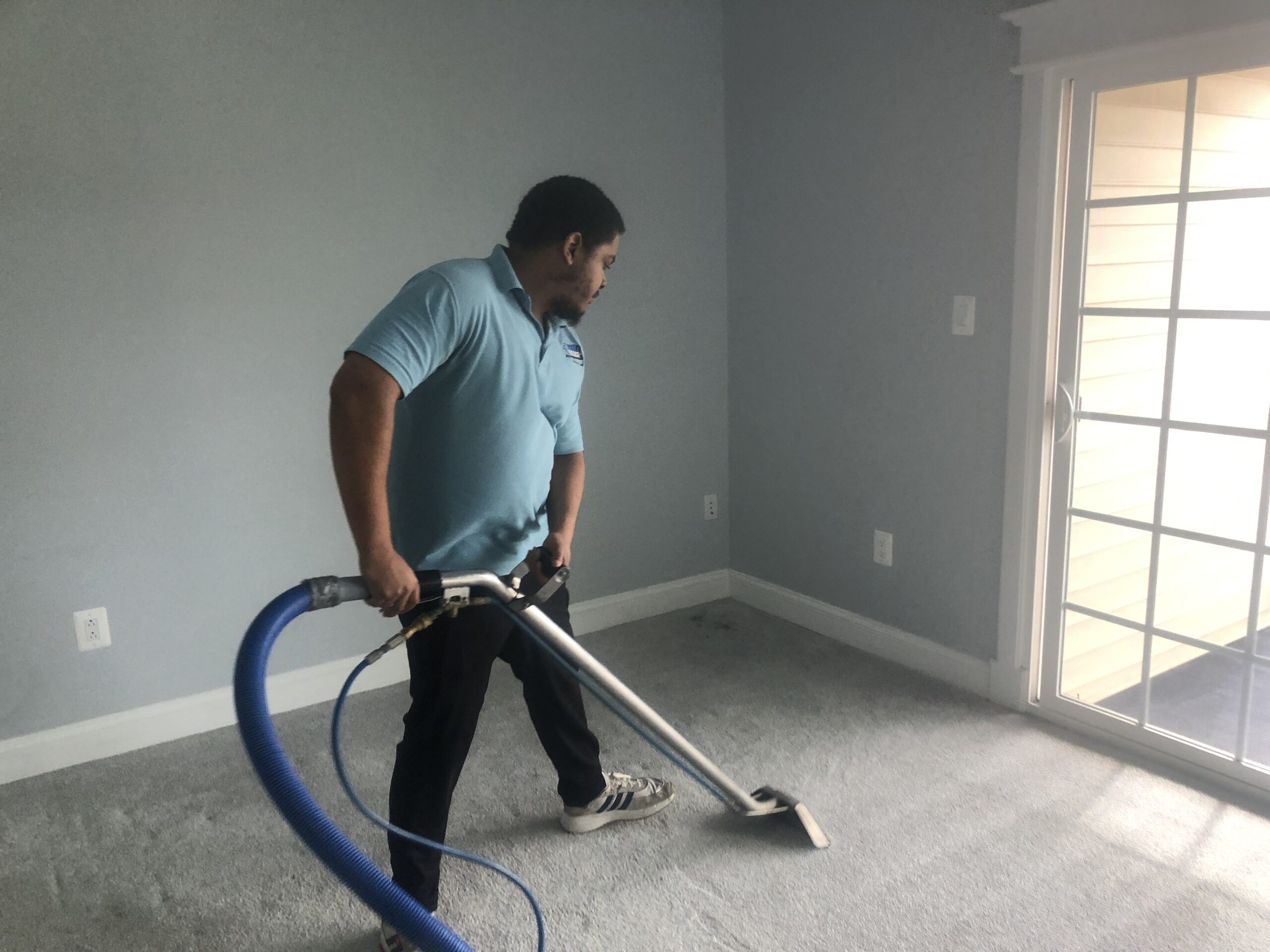 one of the employees cleaning the carpets on Northern Virginia