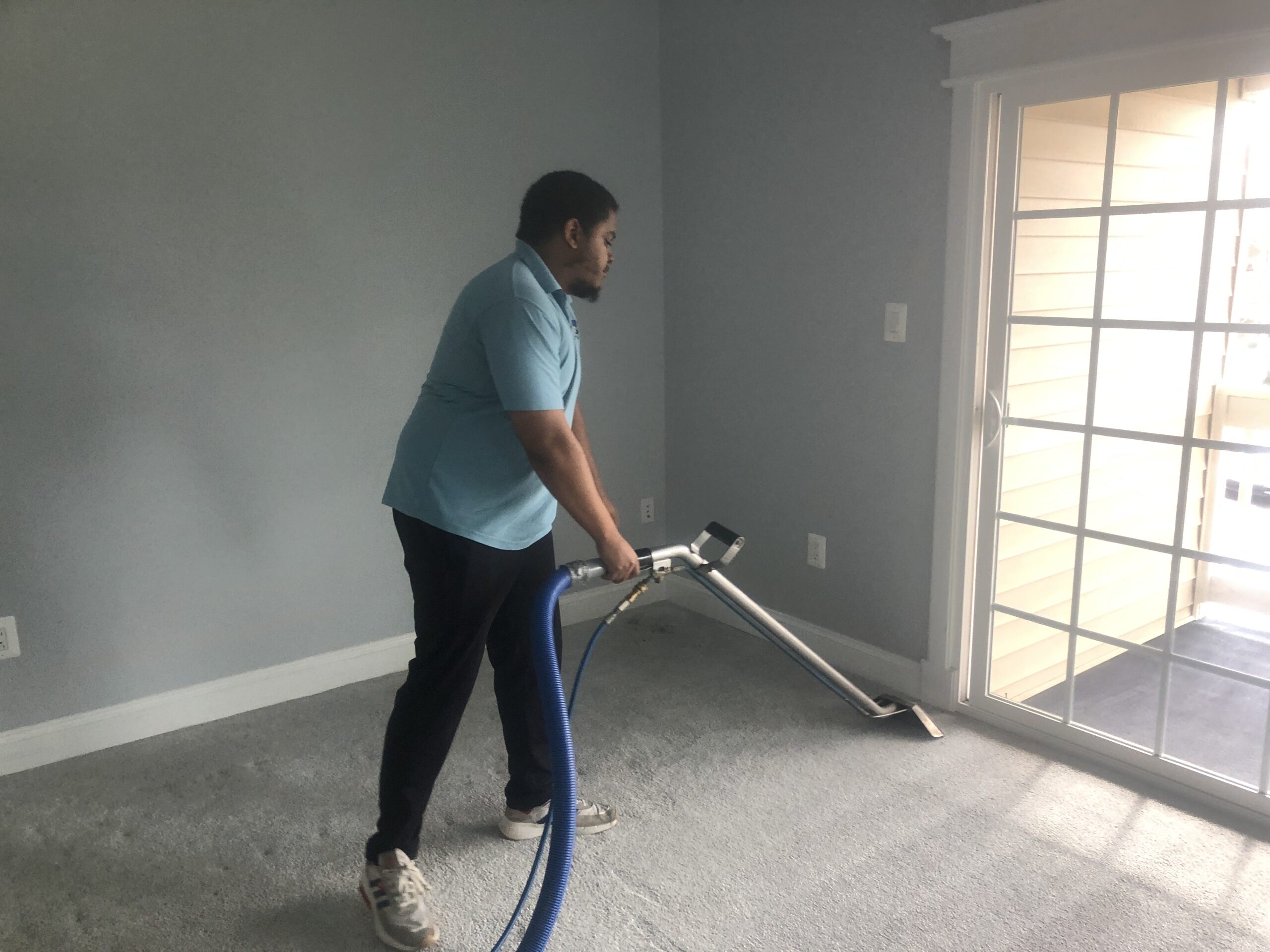 one of the employees carpet cleaning from the Maryland